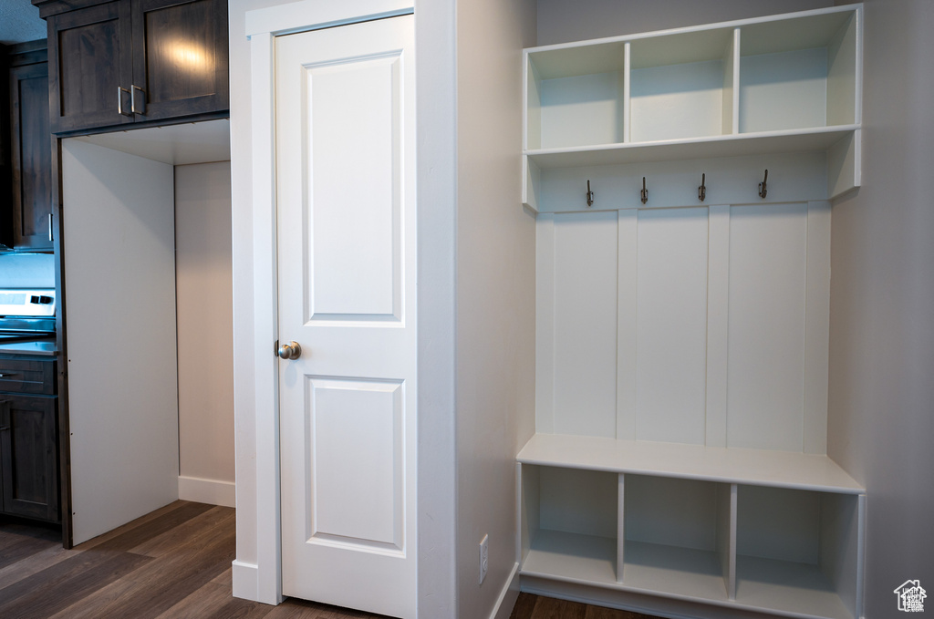 Mudroom with dark hardwood / wood-style flooring