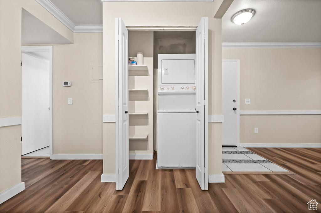 Closet featuring stacked washer / dryer