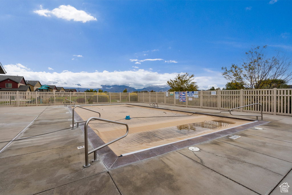 View of pool featuring a mountain view