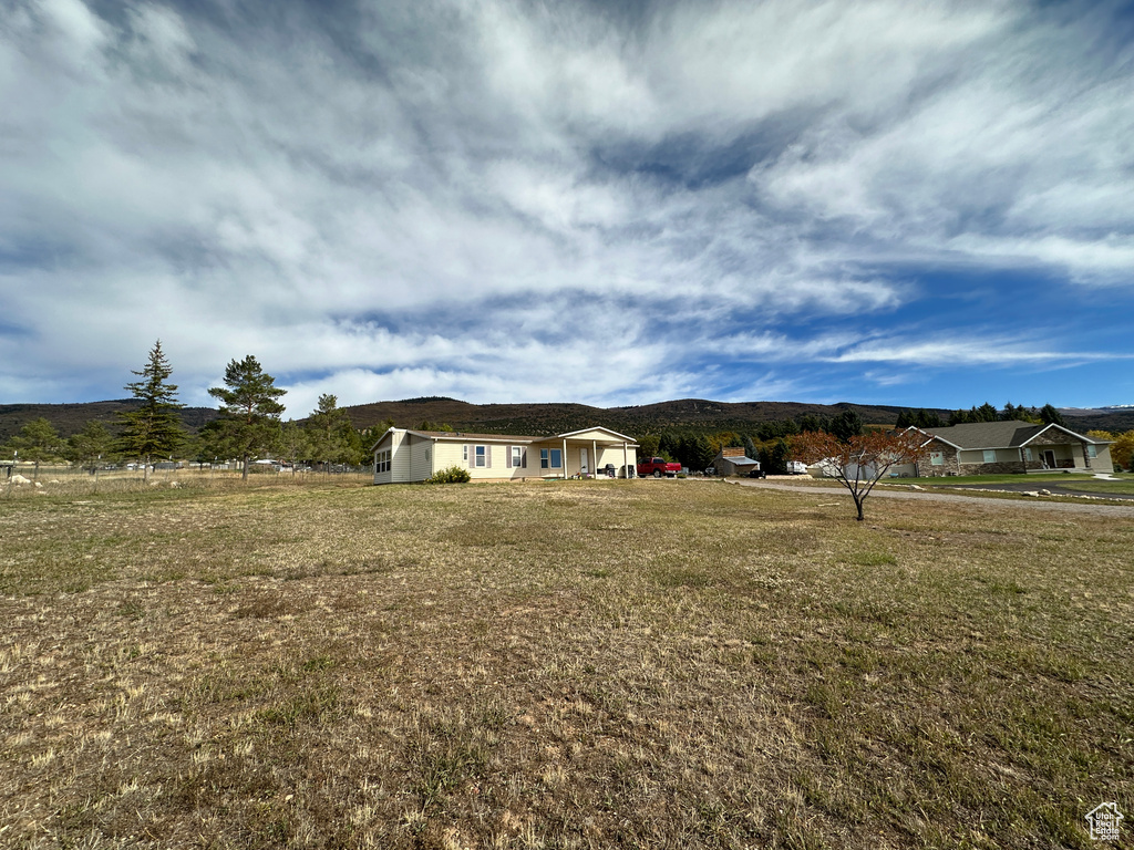 View of yard with a mountain view