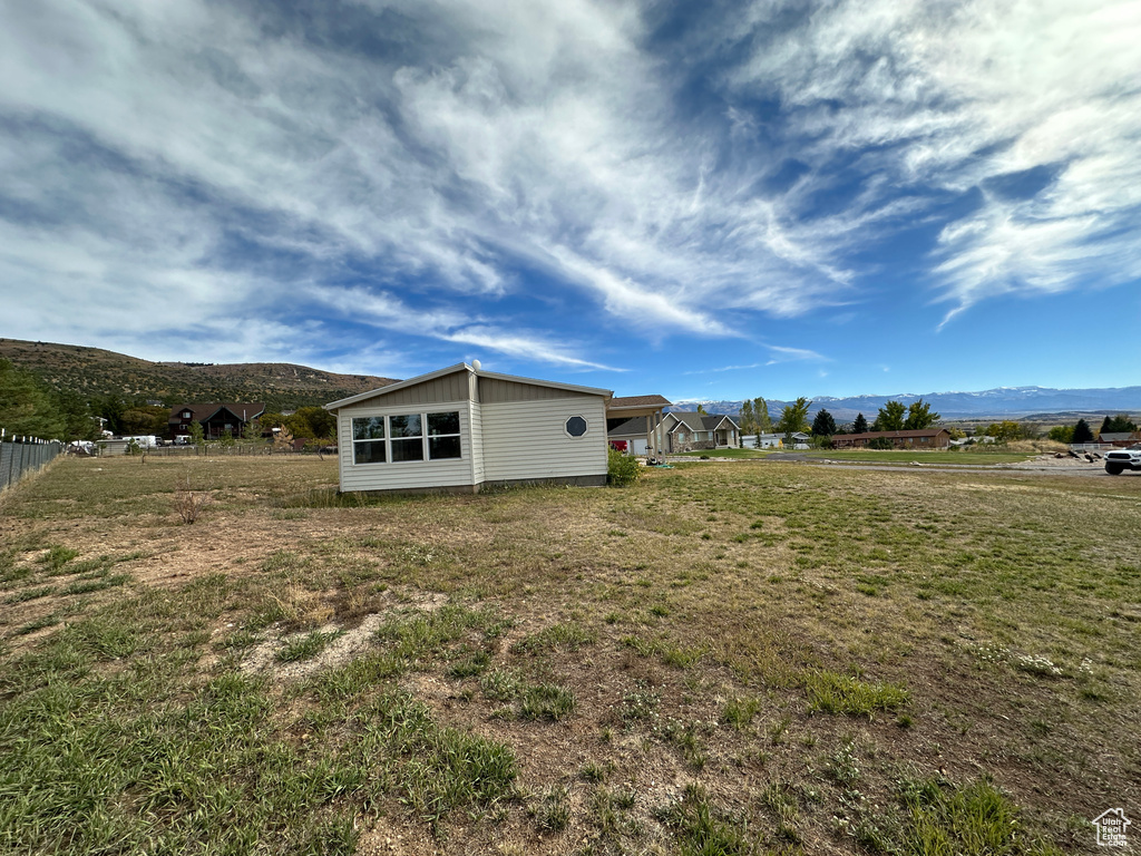 Exterior space featuring a mountain view