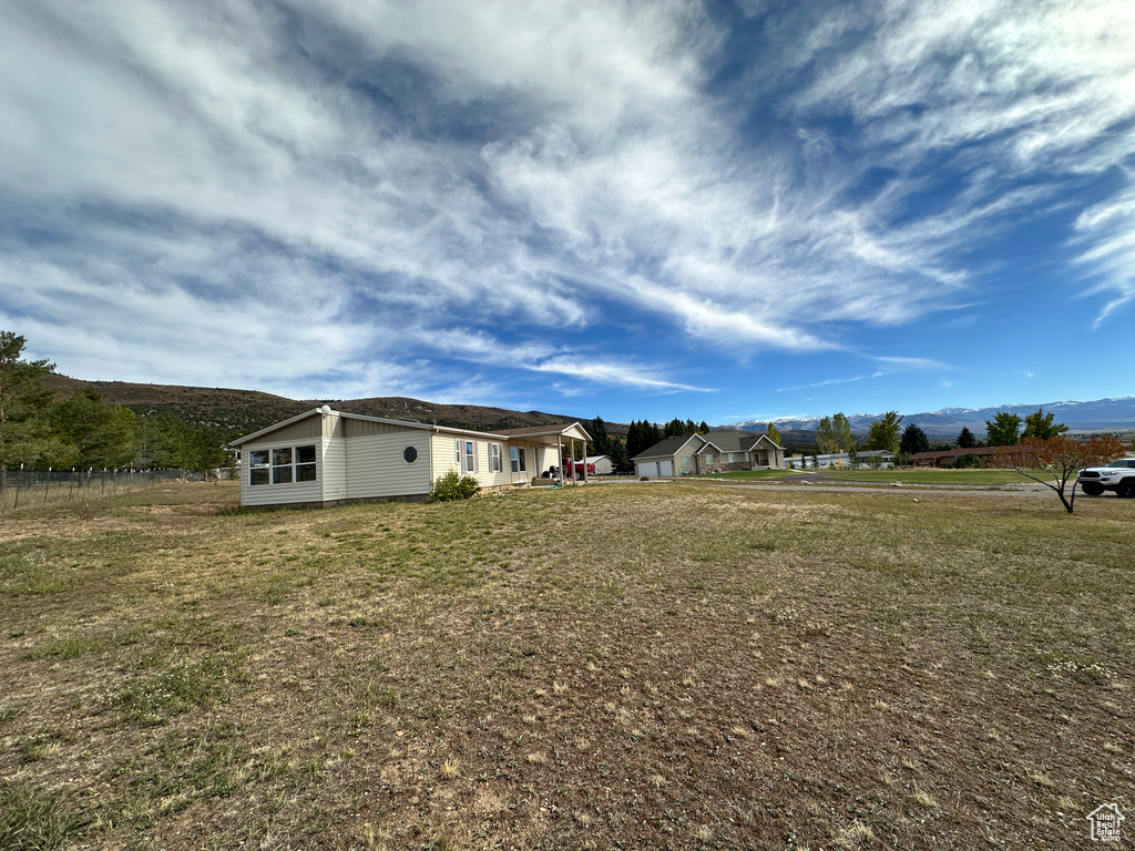 View of yard featuring a mountain view