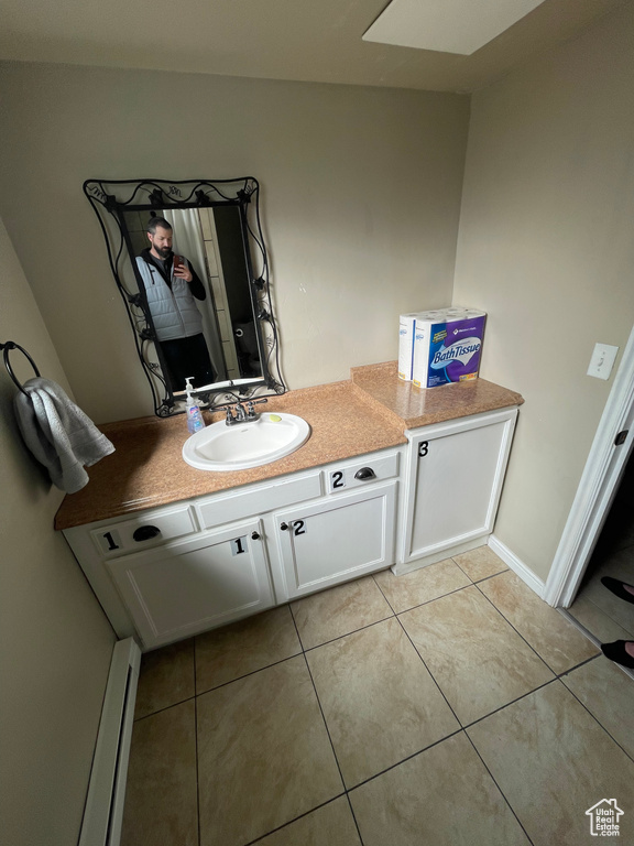 Bathroom with vanity and tile patterned floors