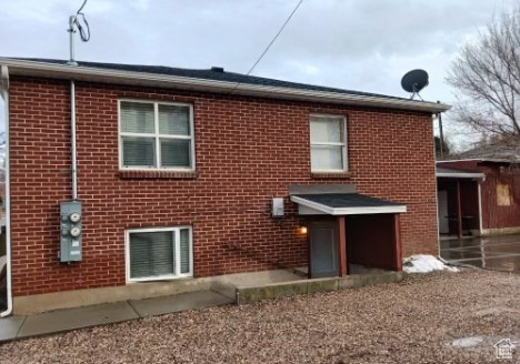 Rear view of house with a patio area