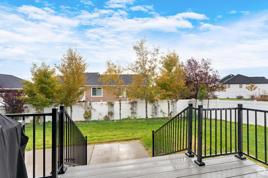 Deck with grilling area and a lawn