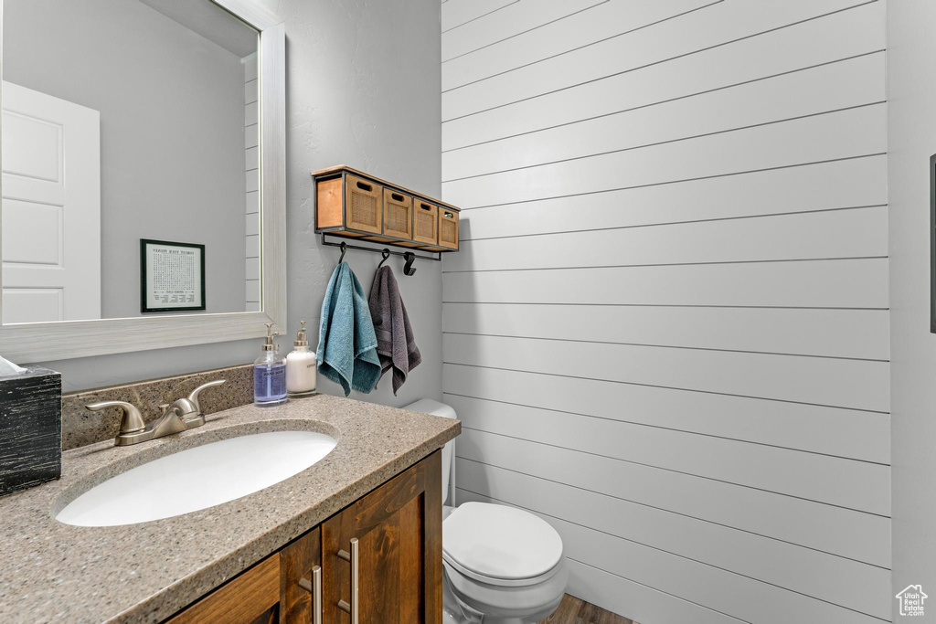 Bathroom with toilet and vanity