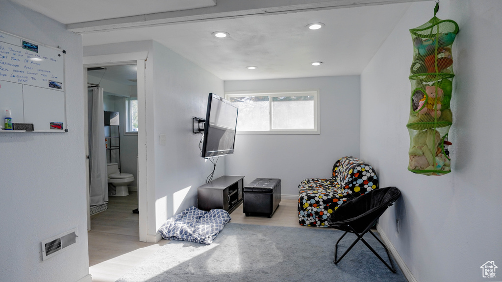 Sitting room featuring light hardwood / wood-style flooring