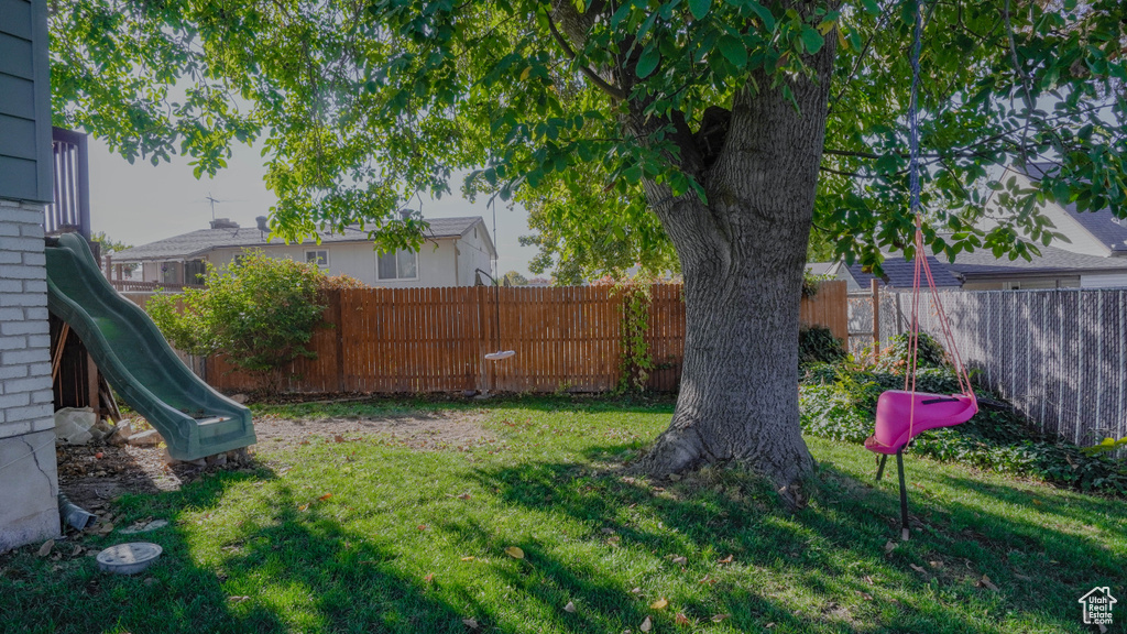 View of yard with a playground