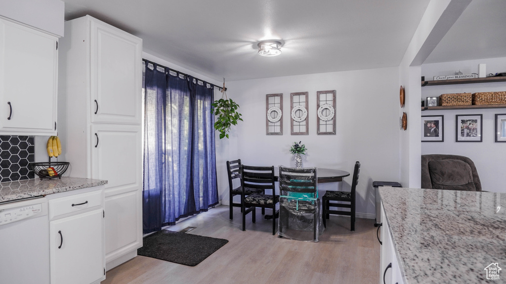 Dining room featuring light hardwood / wood-style flooring