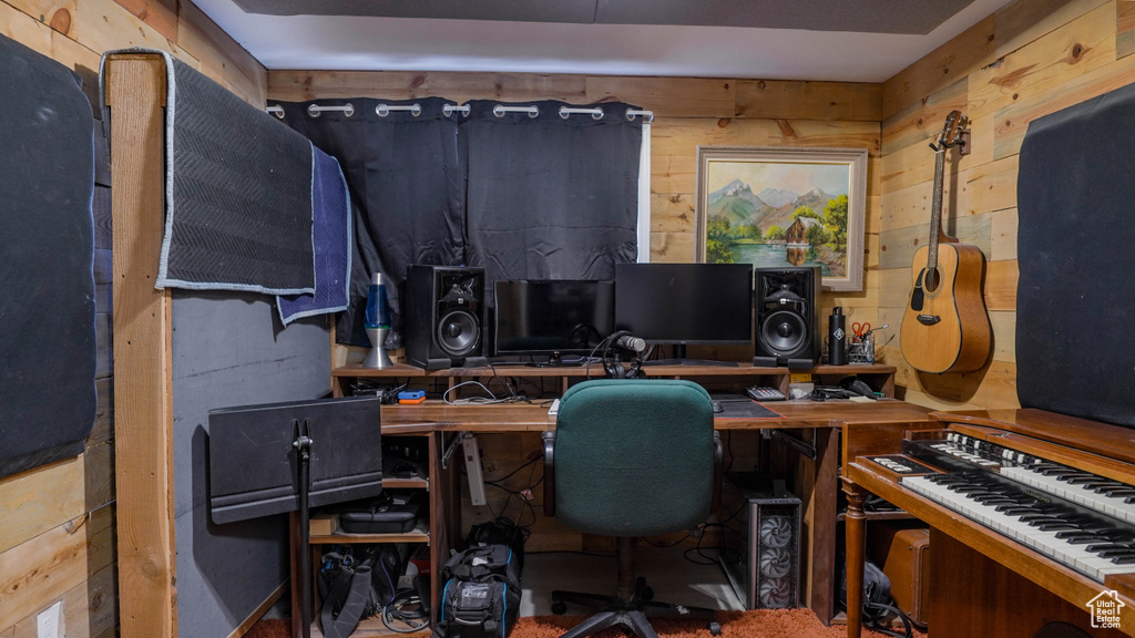 Office space featuring wooden walls