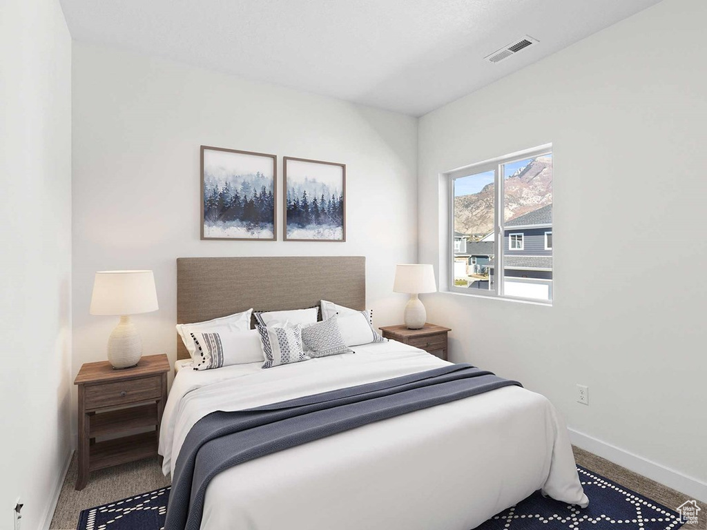 View of carpeted bedroom