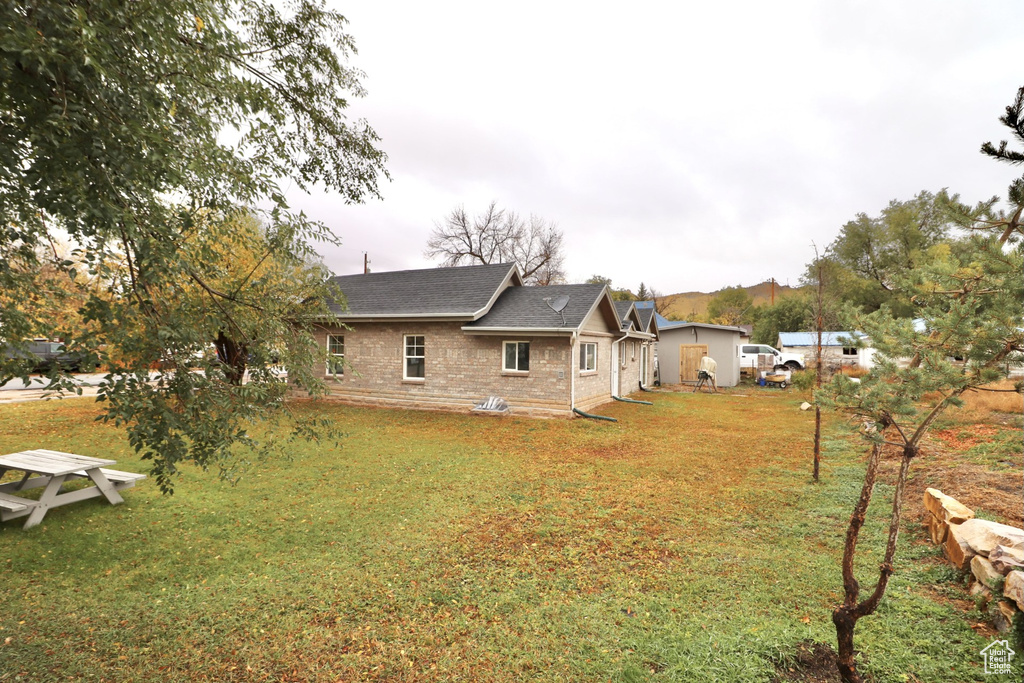 Exterior space with a yard