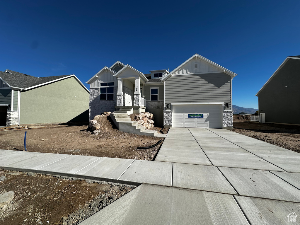 View of front of house with a garage