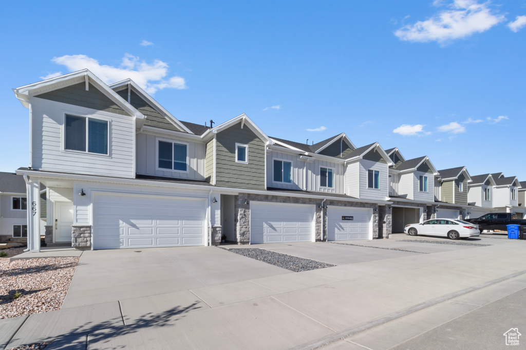 Multi unit property featuring a garage