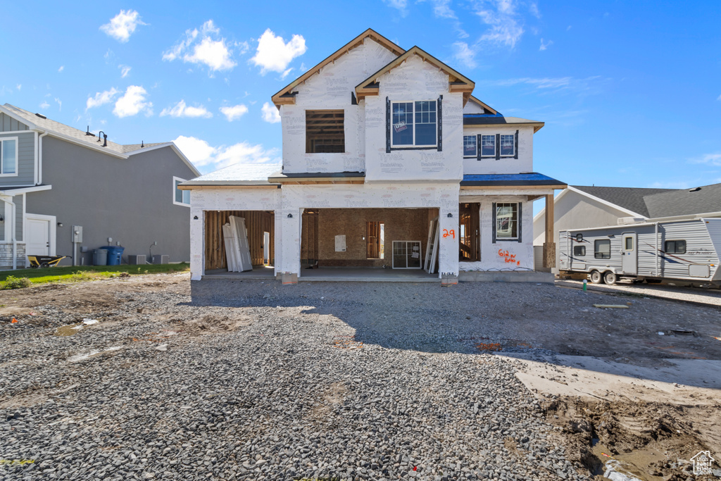 View of front of house with a patio