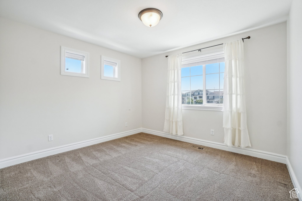 Unfurnished room featuring carpet floors