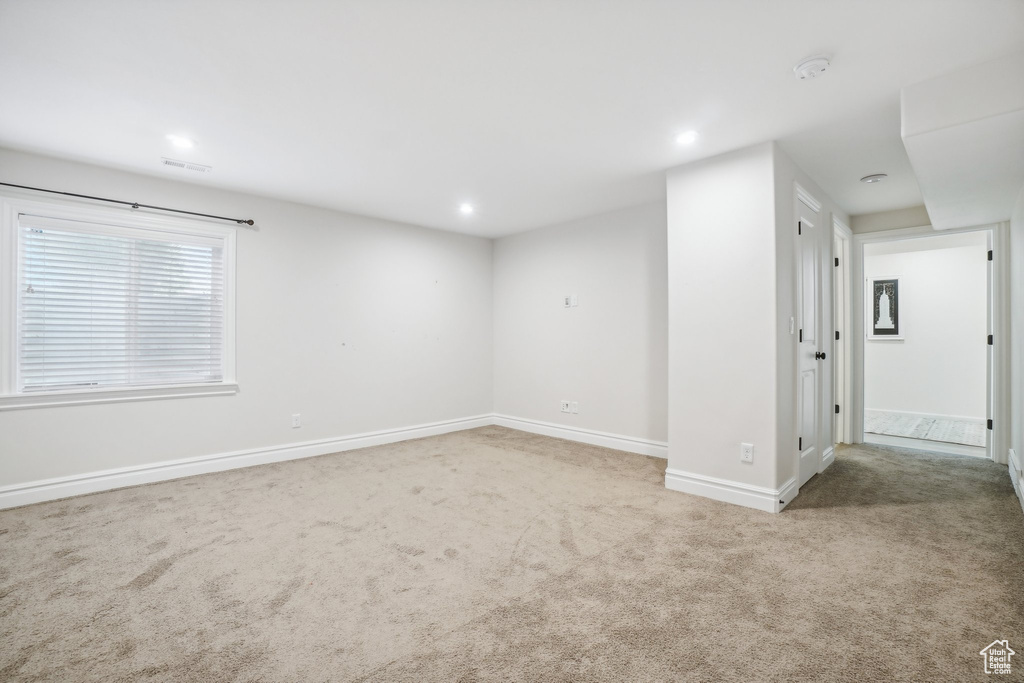 View of carpeted spare room