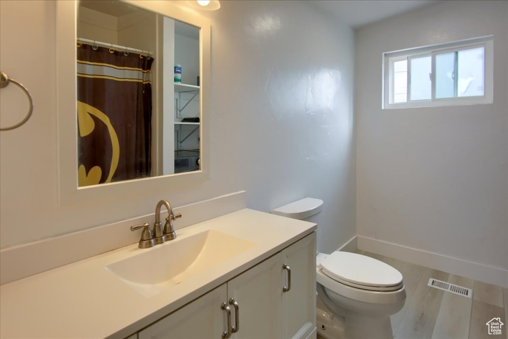 Bathroom with toilet and vanity