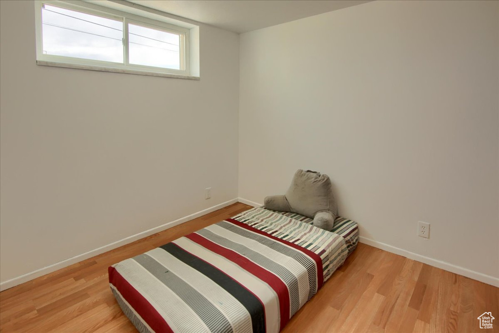 Bedroom featuring light wood-type flooring