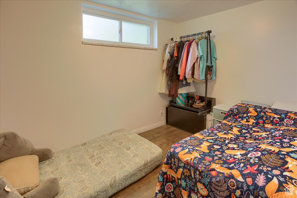 Bedroom with light wood-type flooring