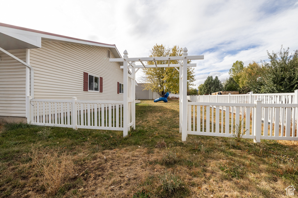 View of yard with a pergola