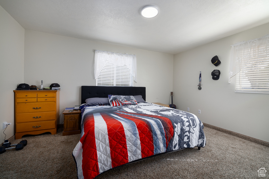 View of carpeted bedroom
