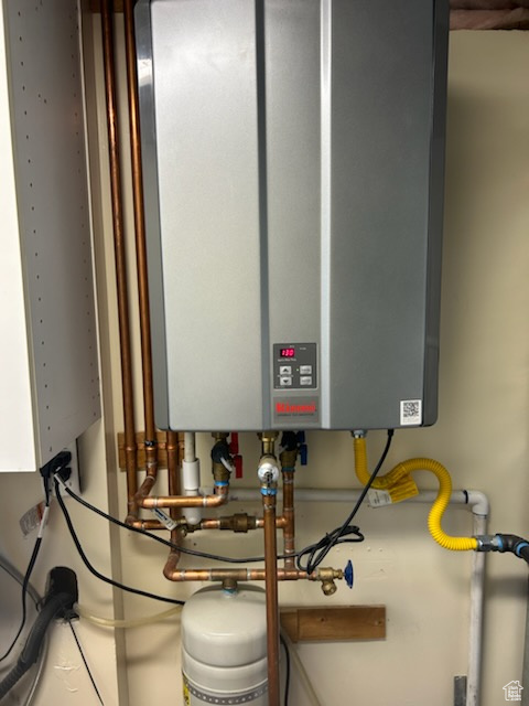 Utility room with tankless water heater