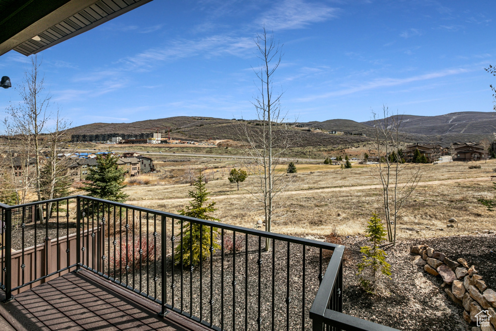 Balcony featuring a mountain view