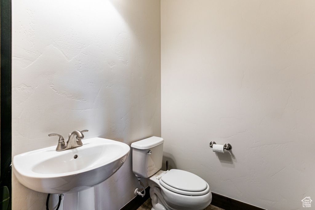 Bathroom with toilet and sink