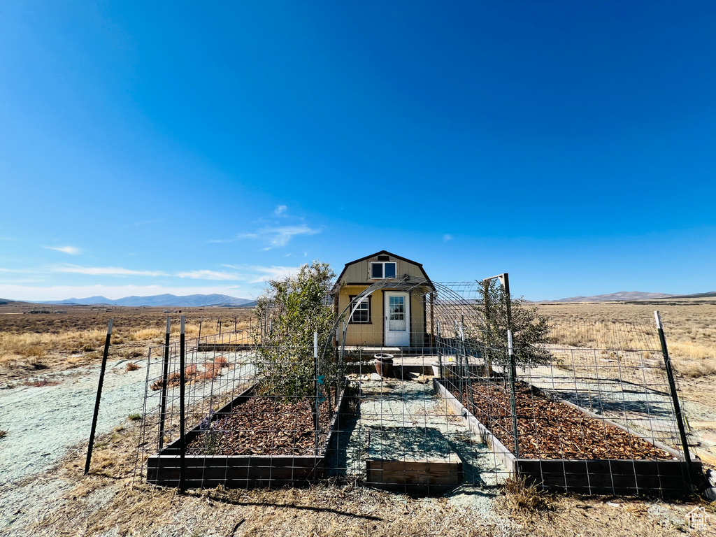 View of front facade featuring a rural view and a mountain view