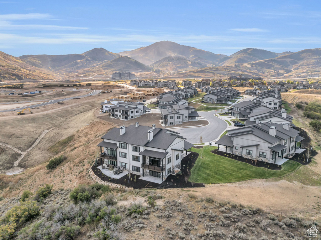 Birds eye view of property with a mountain view