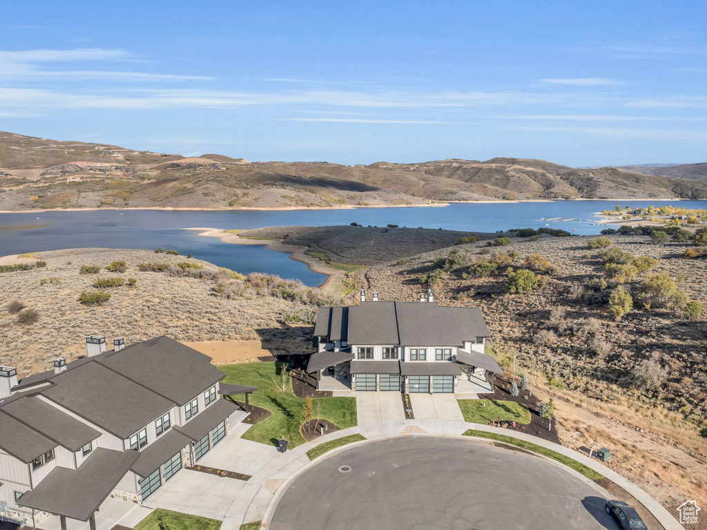 Bird's eye view with a water and mountain view