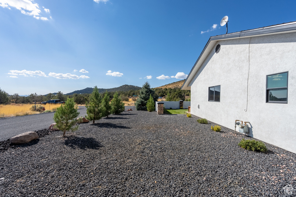 View of yard with a mountain view