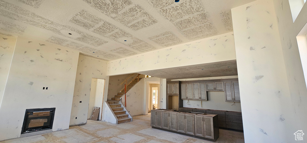 Kitchen featuring a fireplace