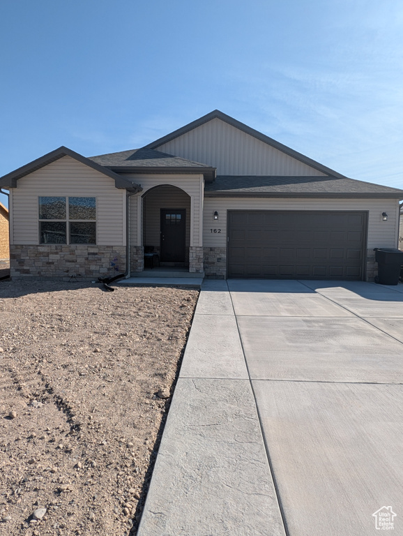 Ranch-style home featuring a garage