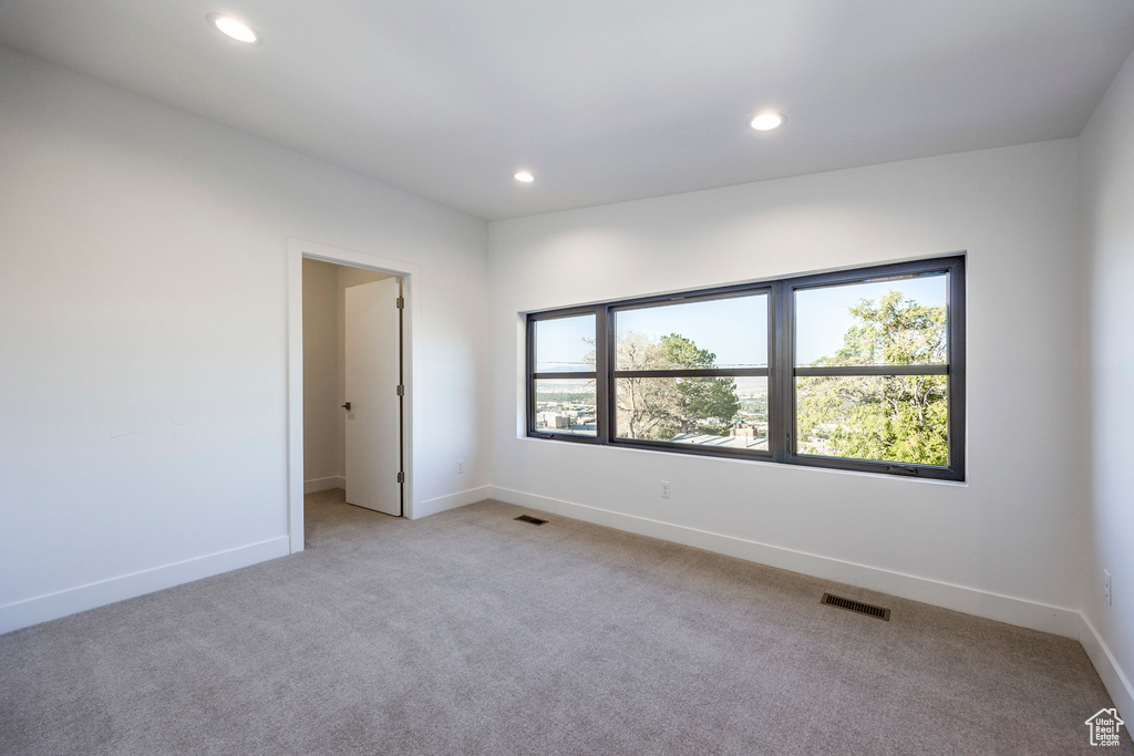 Spare room with light carpet