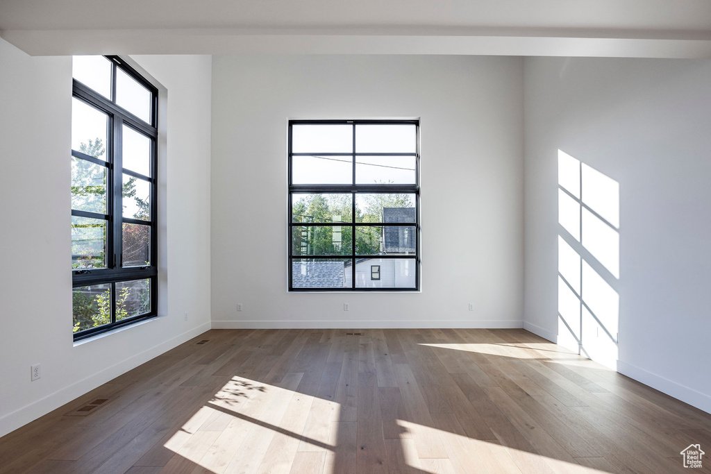 Spare room with light hardwood / wood-style floors