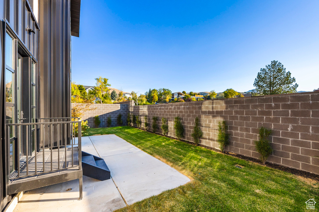 View of yard featuring a patio area