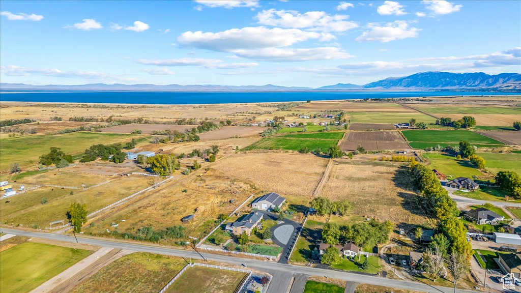 Aerial view featuring a water and mountain view