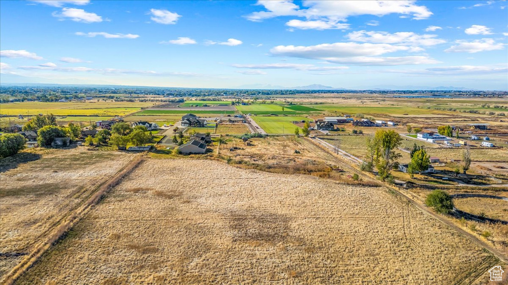 Birds eye view of property featuring a rural view