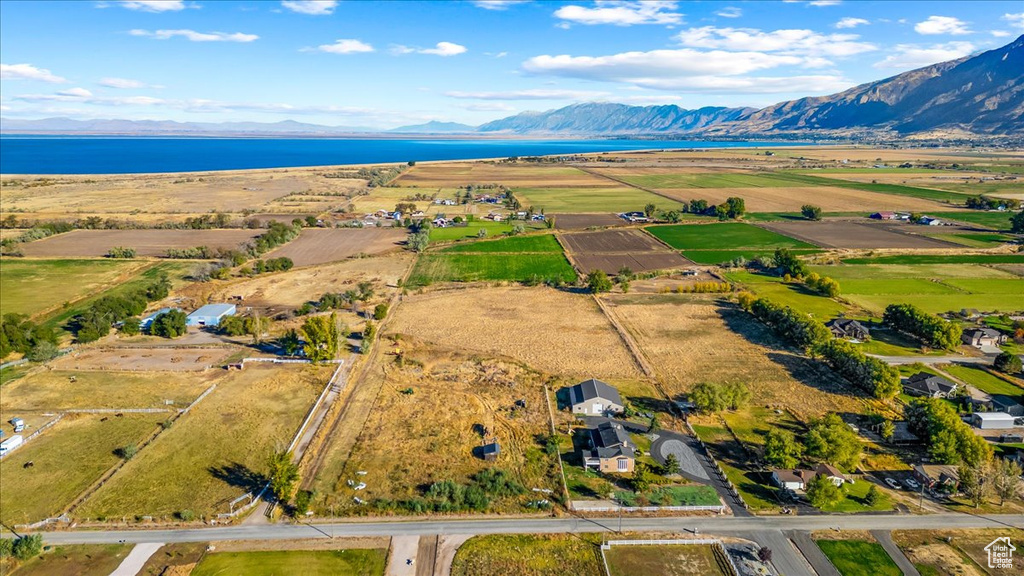 Drone / aerial view with a water and mountain view