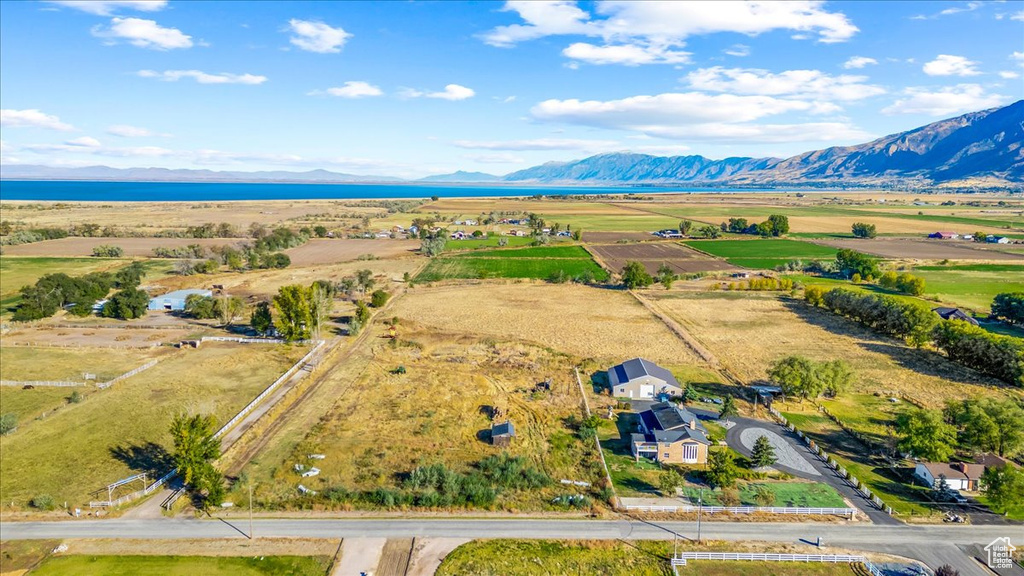 Birds eye view of property with a mountain view and a rural view