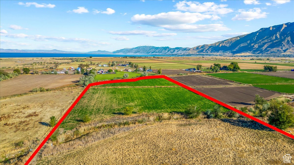 Drone / aerial view with a mountain view and a rural view