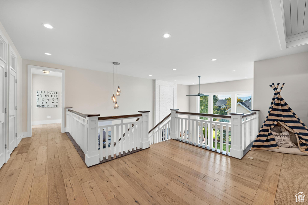 Hallway featuring light wood-type flooring