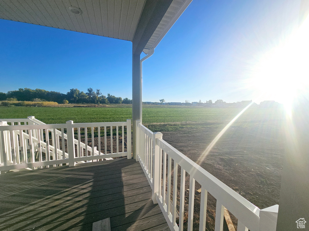 Wooden deck with a rural view