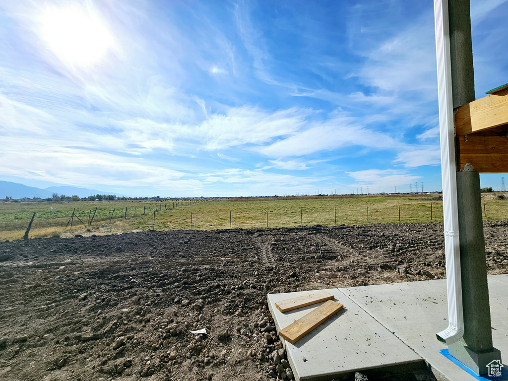 View of yard featuring a patio area and a rural view