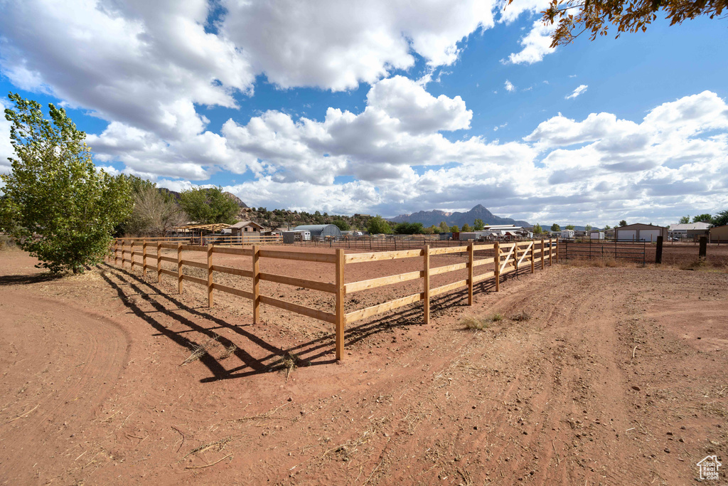 View of yard featuring a mountain view and a rural view