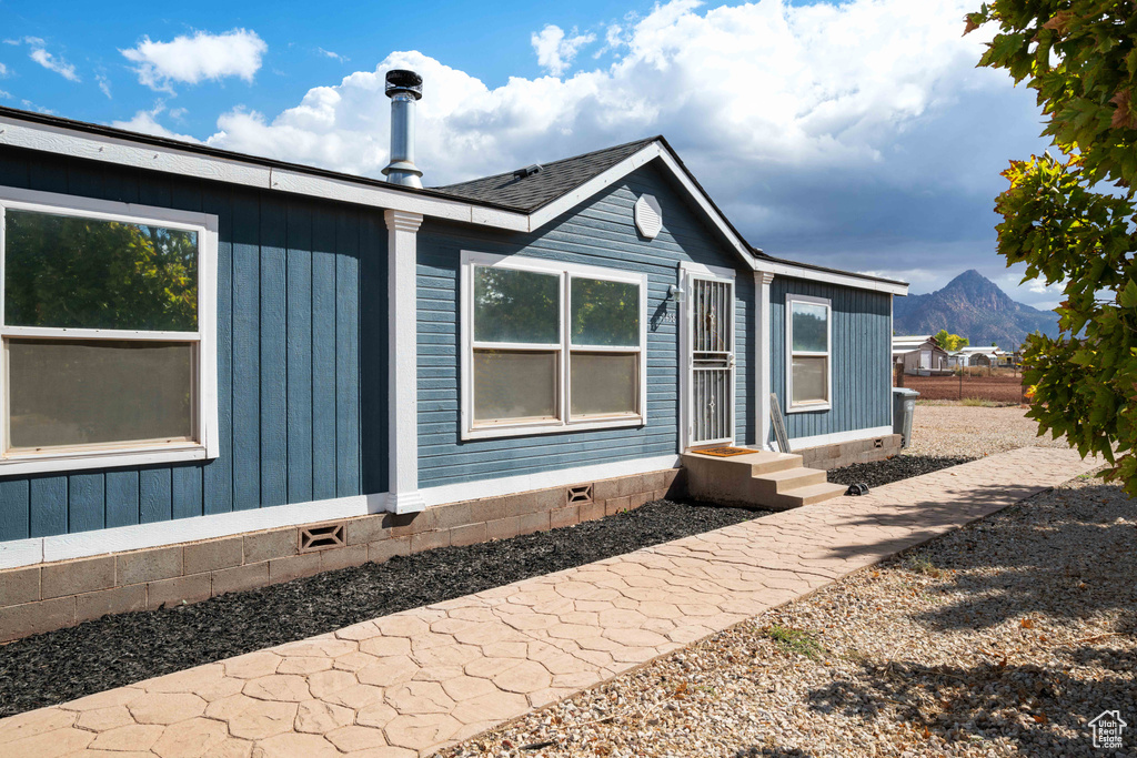 Exterior space featuring a mountain view