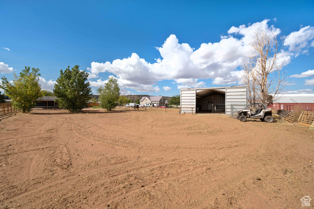 View of yard with an outbuilding