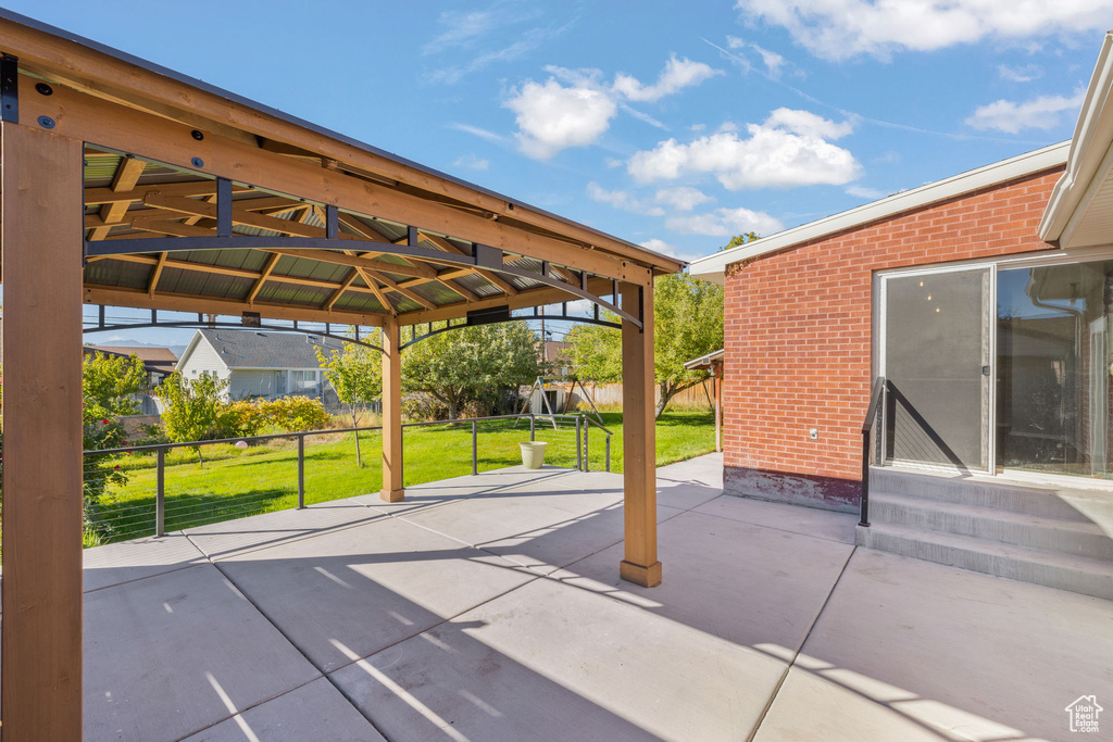 View of patio featuring a gazebo